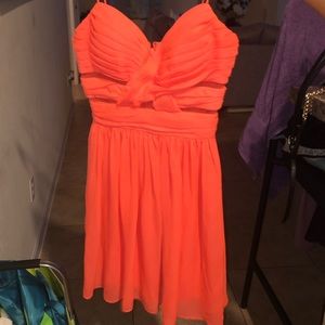 A coral colored dress!